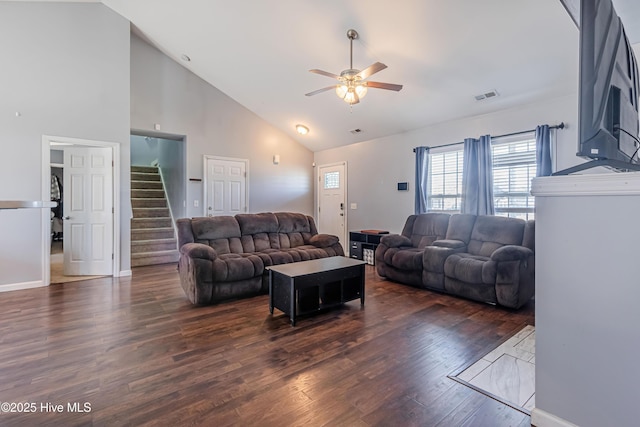 living room featuring ceiling fan, dark hardwood / wood-style floors, and high vaulted ceiling