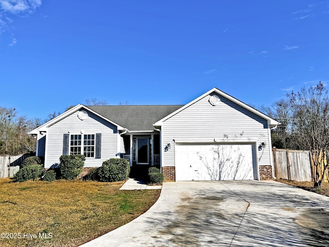 ranch-style home with a front yard and a garage