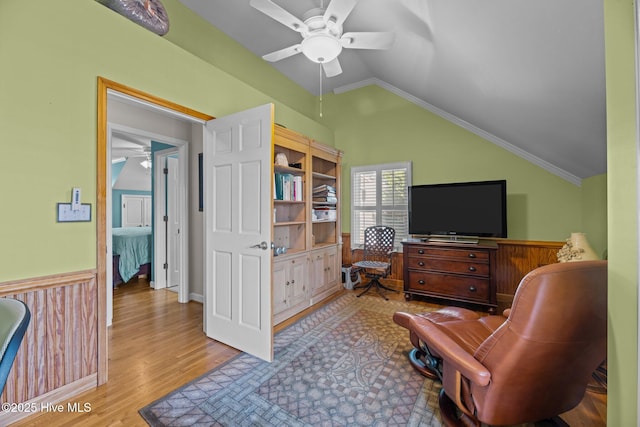 sitting room featuring lofted ceiling, ceiling fan, and light hardwood / wood-style flooring