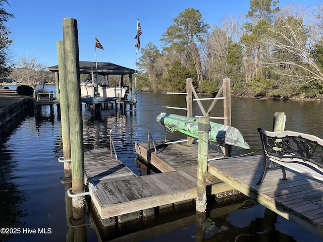 view of dock with a water view