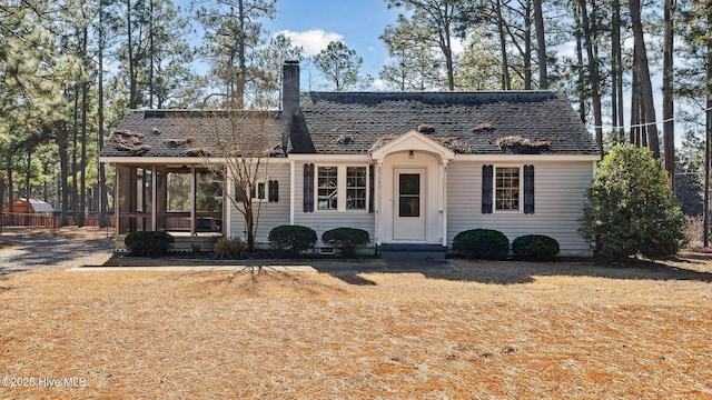 view of front of home with a front yard