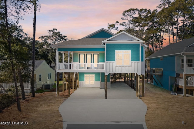 view of front of home with a carport