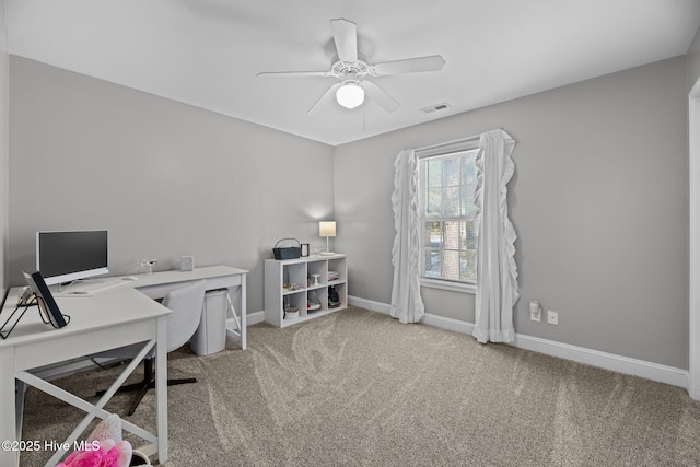 home office featuring ceiling fan and carpet flooring