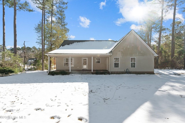 rear view of house with a porch