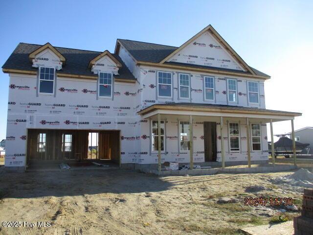 unfinished property with a porch