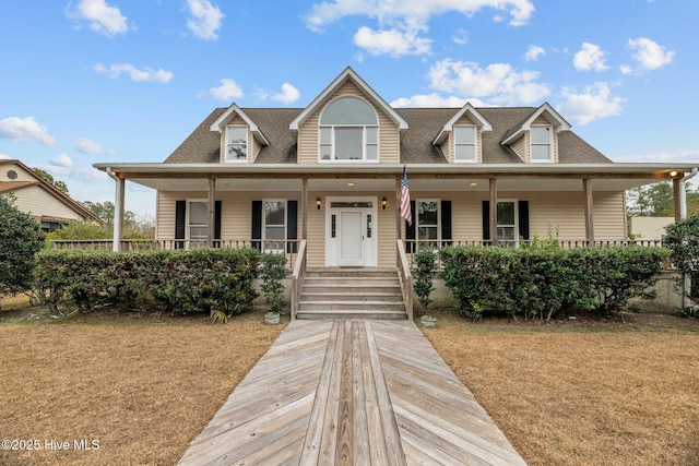 view of front of property with a front yard and a porch