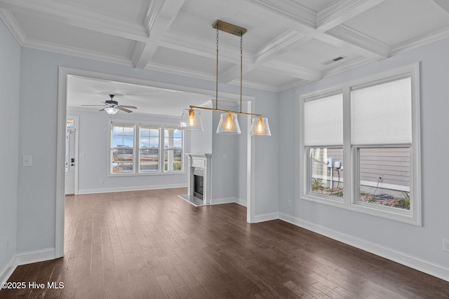 unfurnished living room with beamed ceiling, dark hardwood / wood-style flooring, ceiling fan, and coffered ceiling