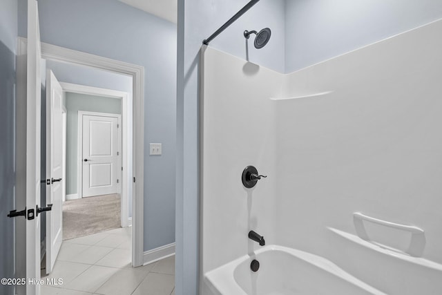 bathroom featuring  shower combination and tile patterned floors