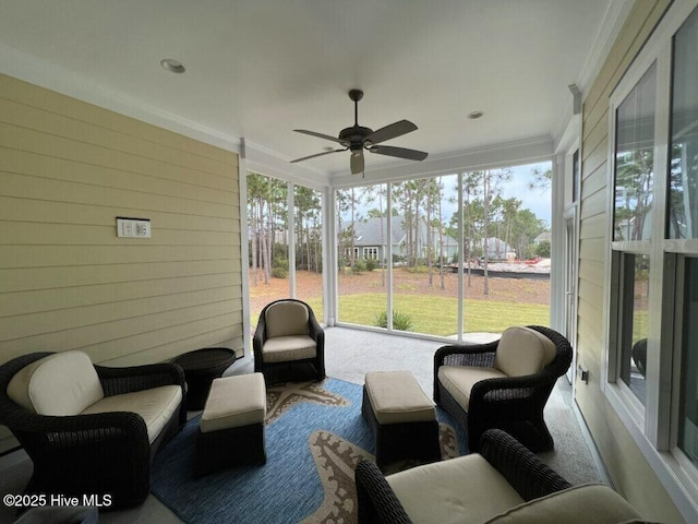 sunroom / solarium with ceiling fan