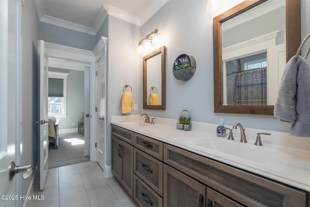 bathroom featuring tile patterned flooring, vanity, and crown molding