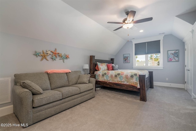 carpeted bedroom featuring lofted ceiling and ceiling fan