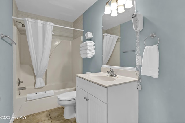 full bathroom featuring toilet, shower / bath combo, vanity, and tile patterned floors