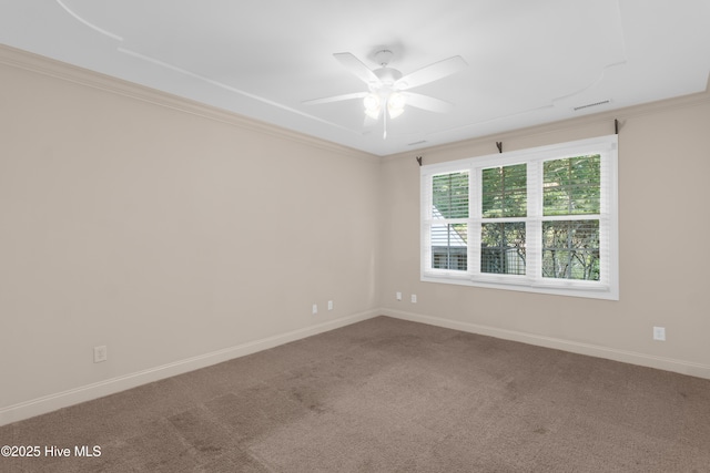 unfurnished room with carpet floors, ceiling fan, and crown molding