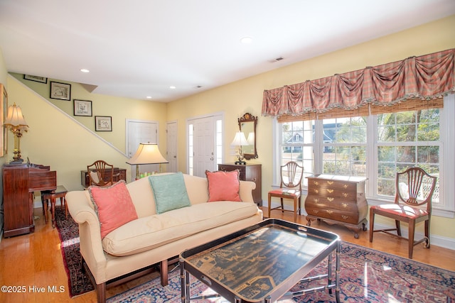 living room with light hardwood / wood-style floors