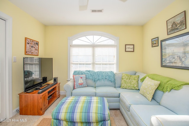 living room with light colored carpet