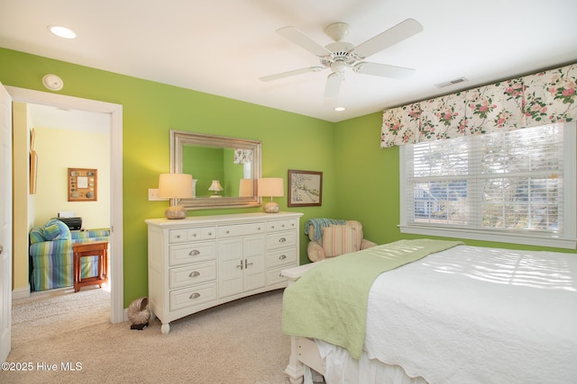 carpeted bedroom with ceiling fan