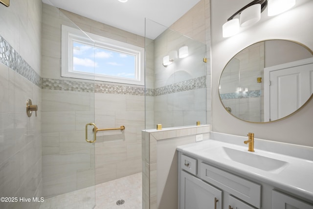 bathroom featuring vanity and walk in shower