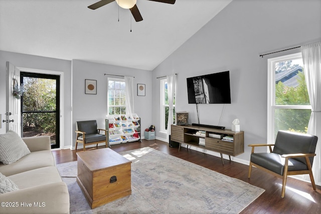 living room featuring high vaulted ceiling, dark hardwood / wood-style floors, and ceiling fan