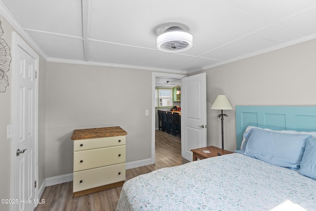 bedroom with light hardwood / wood-style floors