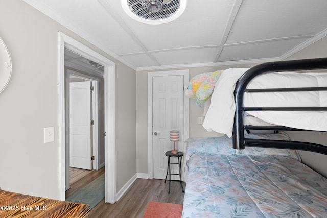 bedroom with wood-type flooring