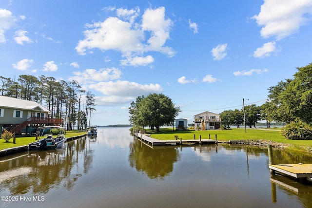 property view of water featuring a boat dock