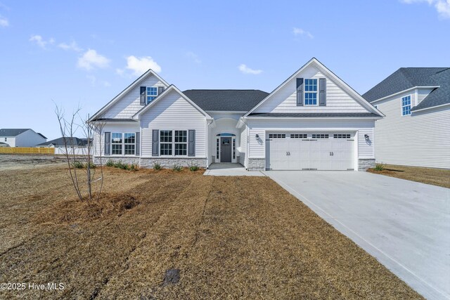 craftsman-style home with a front lawn