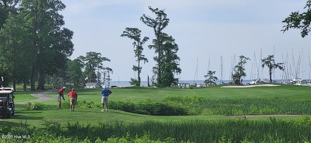 surrounding community featuring a yard