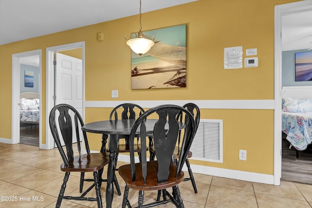 view of tiled dining area