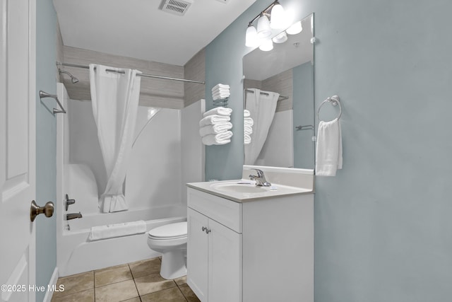 full bathroom with tile patterned flooring, shower / bath combination with curtain, toilet, and vanity