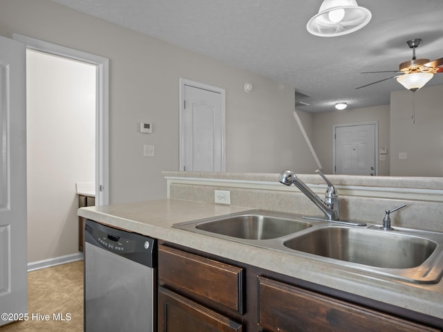 kitchen featuring dishwasher, ceiling fan, a textured ceiling, sink, and dark brown cabinets