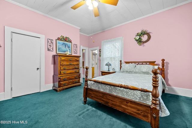 carpeted bedroom with crown molding and ceiling fan