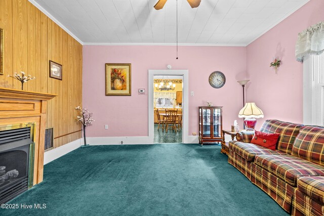 living room with dark carpet, ceiling fan, and ornamental molding