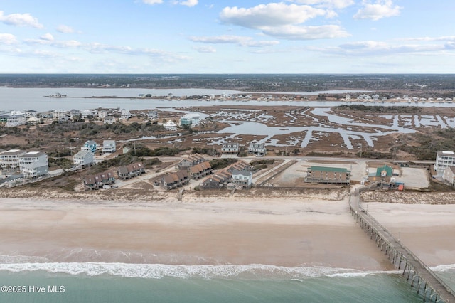 aerial view featuring a water view and a beach view