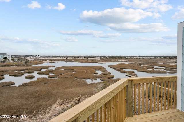 exterior space with a water view