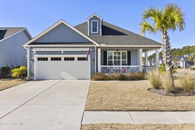 view of front facade featuring a garage and a porch