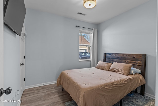 bedroom featuring light hardwood / wood-style flooring