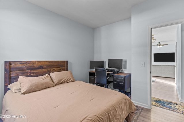 bedroom featuring wood-type flooring