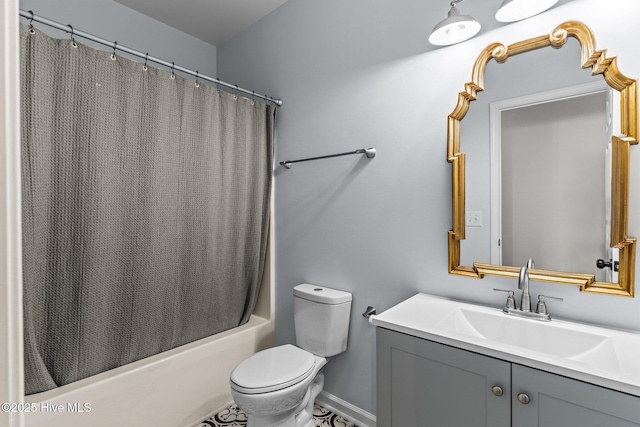 full bathroom featuring shower / tub combo with curtain, vanity, and toilet