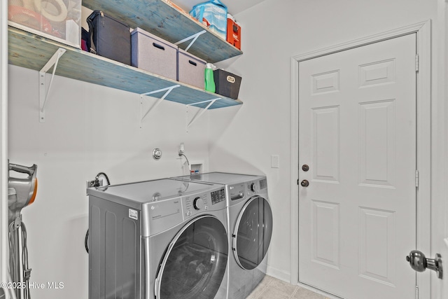 laundry room with washer and clothes dryer