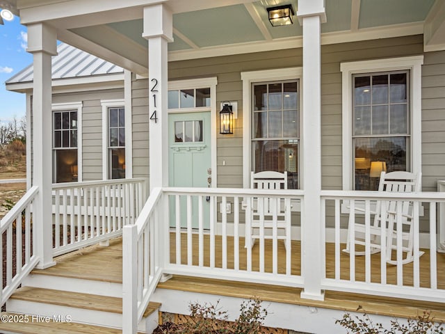 doorway to property with a porch