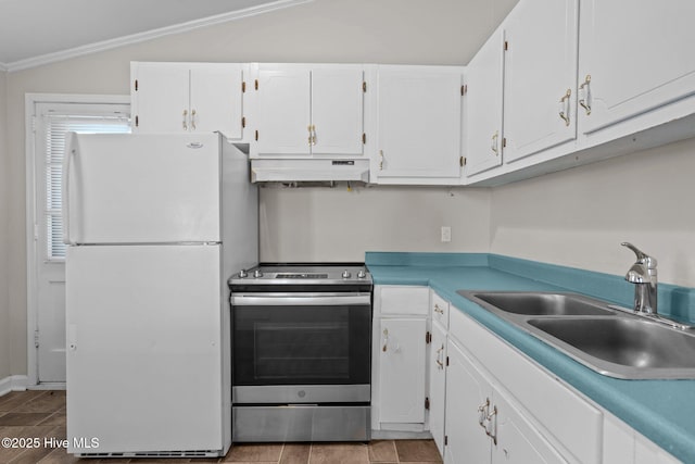 kitchen featuring stainless steel electric range, a sink, freestanding refrigerator, and white cabinetry