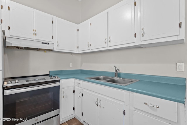 kitchen featuring under cabinet range hood, a sink, white cabinetry, and stainless steel electric stove