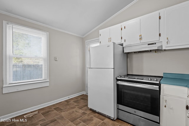 kitchen with under cabinet range hood, visible vents, white cabinets, stainless steel electric range, and freestanding refrigerator