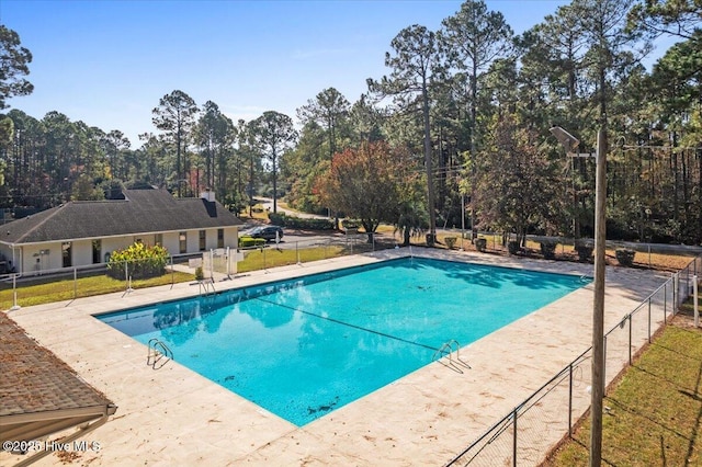 view of pool featuring a patio