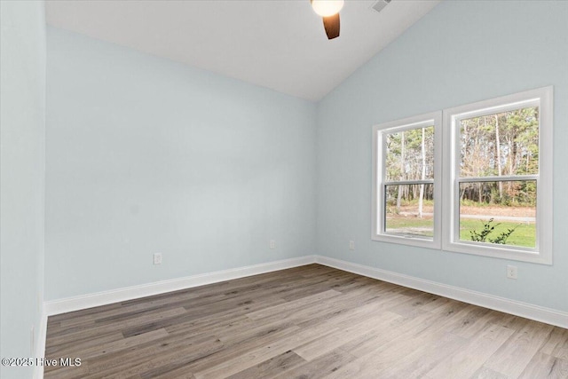 657 Boundary Loop NW, Carolina Shores, NC 28467 - spare room featuring a ceiling fan, wood finished floors, vaulted ceiling, and baseboards
