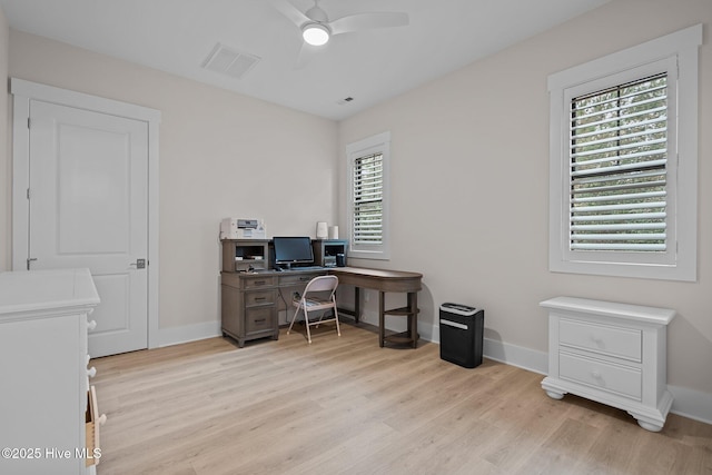 home office with ceiling fan and light wood-type flooring