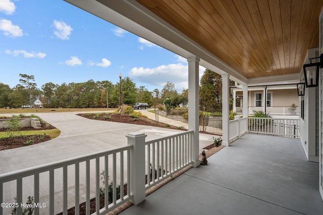 view of patio featuring a porch