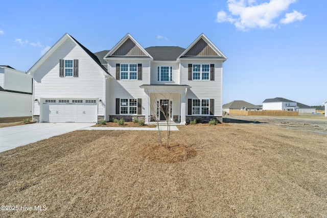 view of front of home with a front lawn, a porch, and a garage