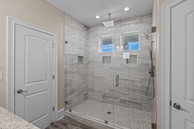 bathroom with an enclosed shower