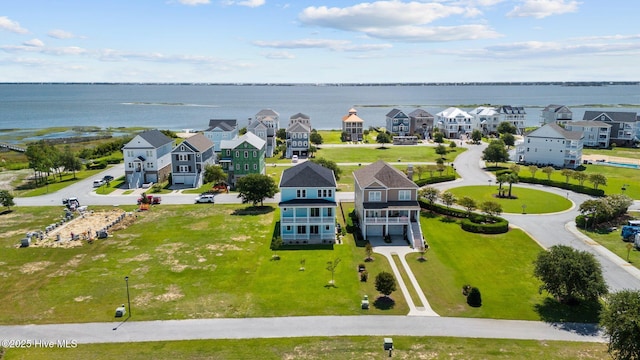 drone / aerial view with a water view